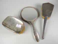 A matching silver backed brush & hand mirror together with another gentleman's machine turned silver