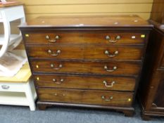 A good nineteenth century mahogany secretaire chest having false drawers dropping down to reveal