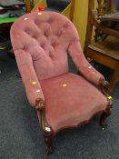 An antique button-back ladies armchair Condition reports provided on request by email for this
