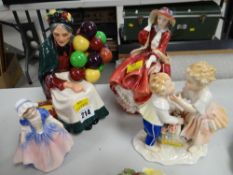 A Royal Doulton figure 'The Old Balloon Seller' - HN1315 together with a Royal Doulton figure 'Top