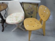 A mid-century plastic swivel chair, wooden chair & a vintage fire screen Condition reports