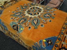 A rust ground Persian wool pile carpet, 168 x 370cms Condition reports provided on request by