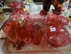 A parcel of cranberry glass items Condition reports provided on request by email for this auction