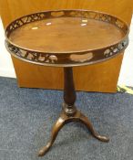 An antique mahogany galleried tripod table Condition reports provided on request by email for this