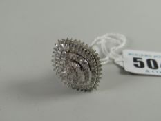 A marquise-shaped diamond chip cluster dress ring Condition reports provided on request by email for