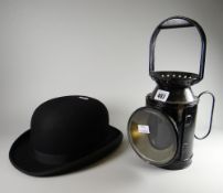 A vintage coaching lamp & a Christy's of London vintage bowler hat Condition reports provided on