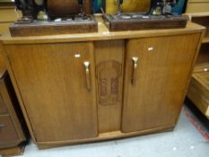 A two-door vintage oak carved-centre sideboard Condition reports provided on request by email for
