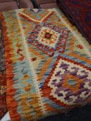 A vegetable dye wool Choli Kelim runner, 194 x 60cms Condition reports provided on request by