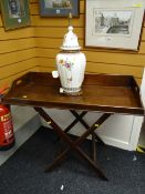 A mahogany folding butler's tray & an Oriental-style pottery table lamp Condition reports provided
