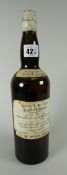 A bottle of James Buchanan & Co Black & White scotch whisky circa 1920s Condition reports provided