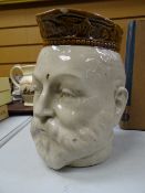 An early twentieth century stoneware pottery tankard in the form of the head of George V, stamp mark