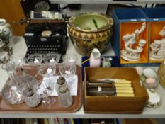 A quantity of loose cutlery, a cased EPNS liquor set, Oriental-style planter, a set of seven