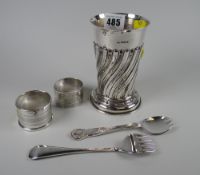 A fluted silver footed cylindrical vase with flared neck, hallmarked for Chester 1894, 5.3oz.