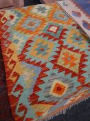 A vegetable dye wool Choli Kelim runner, 262 x 76cms Condition reports provided on request by