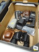 Approx ten assorted cameras including retro 1950s film cameras, Bolex movie camera, Olympus OM 200mm
