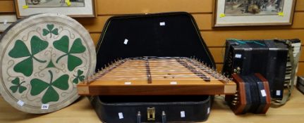 A Celtic hide covered drum & a cased Folkcraft stringed instrument, a Viceroy accordion & a