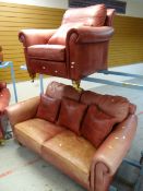 Two red leather Duresta sofas together with a matching leather chair & two footstools Condition rep