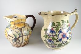A primitive pottery jug, possibly Swansea, together with a Royal Cauldon pottery jug Condition
