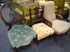 A good quality antique balloon back chair with elaborate carving together with a low armchair &