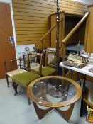 A G-Plan circular-top glass insert coffee table, four chairs for restoration & a carved bamboo