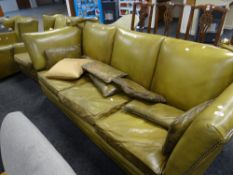 A good quality mid-to-late twentieth century studded leather three-piece suite, the Knole-type