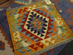 A vegetable dye wool Choli Kelim rug, 52 x 53cms Condition reports provided on request by email