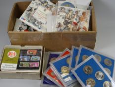A collection of presentation commemorative coinage ETC & a quantity of stamp presentation packs