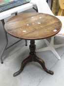 Nineteenth century oak circular top tripod table Condition reports provided on request by email
