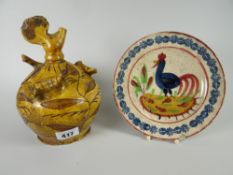 An interesting antique pottery money box vessel with mounted birds & a Llanelly pottery cockerel