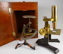 A vintage cased brass microscope by H Field & Son together with a set of vintage tripod postal