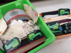 Quantity of mainly loose stamps, first day covers & philatelic material in a green tub Condition