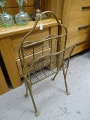 A vintage brass & gauze magazine rack Condition reports provided on request by email for this