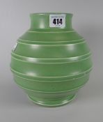 A Wedgwood Keith Murray design pottery vase of ribbed form in green glaze, 19cms high Condition