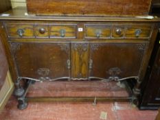 Vintage oak sideboard having carved detail and drop handles