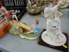 Two Capodimonte figurines of a young boy and girl on a seesaw (slight damage) and a woman in vintage