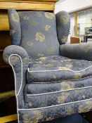 Vintage re-upholstered wingback armchair