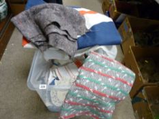 Plastic crate of linen including large British flag