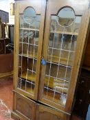 1930's oak bookcase with leaded glass doors (some damage) and interior adjustable shelves