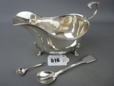 Asprey & Co Ltd silver sauce boat, London 1921, 5.4 troy ozs along with a silver lustre spoon and an