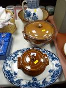 Stoneware mixing bowl, two lidded crocks, a blue and white wash jug etc