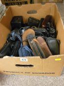 Box of vintage cameras and binoculars