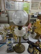 Oriental blue and white porcelain lamp with metal mounts and a Victorian brass with cut glass font