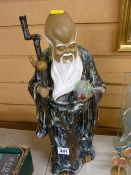 Oriental pottery figurine of a Sage