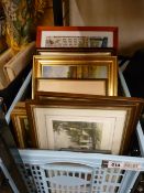 Plastic crate of framed pictures and prints