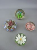 Two millefiori and two floral patterned glass paperweights