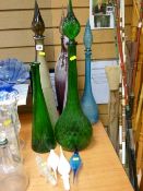 Collection of tall stem bottle vases and stoppers along with four further stoppers