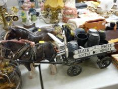 Model shire horse and cart and two further shire horse figurines