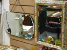 Vintage bevelled edge wall mirror and a modern framed example with floral decoration