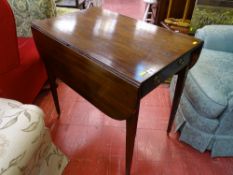 Regency mahogany twin flap Pembroke table with single end drawer on tapering supports and brass