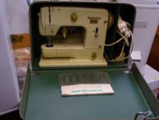 Cased Bernina electric sewing machine E/T